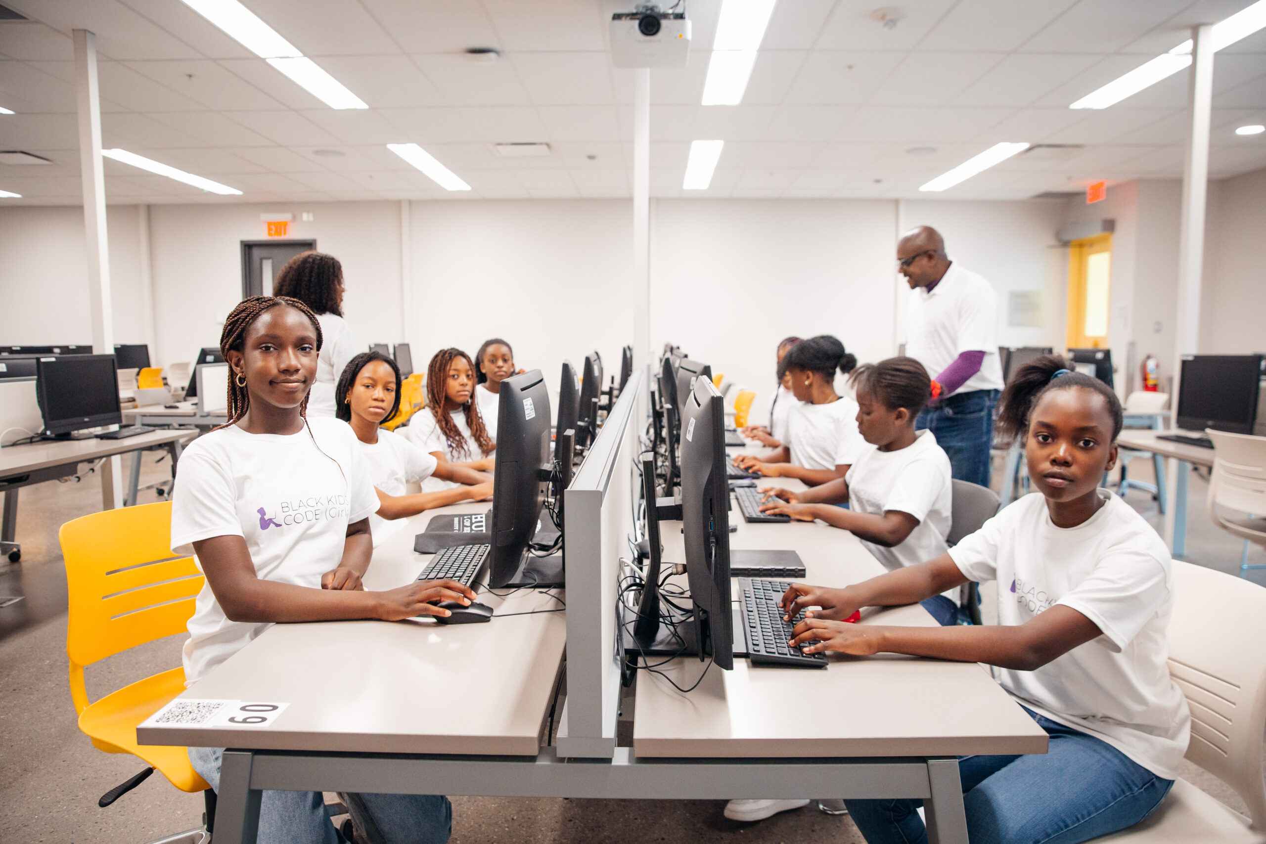 Black Kids in classroom learning programing